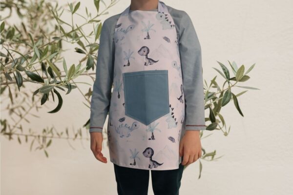 Tablier réversible et imperméable dinosaure